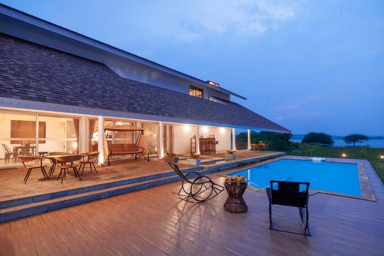 Stayvista'S Eva Villa - Lakeside Luxury With Modern Decor, Pool & Expansive Lawn - Near Sula Nashik Exterior photo